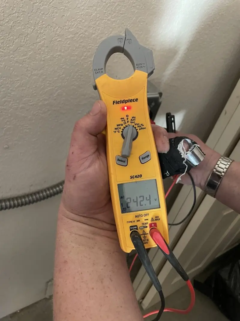 Voltage testing with clamp meter during Whole House Surge Protector in Dunlap